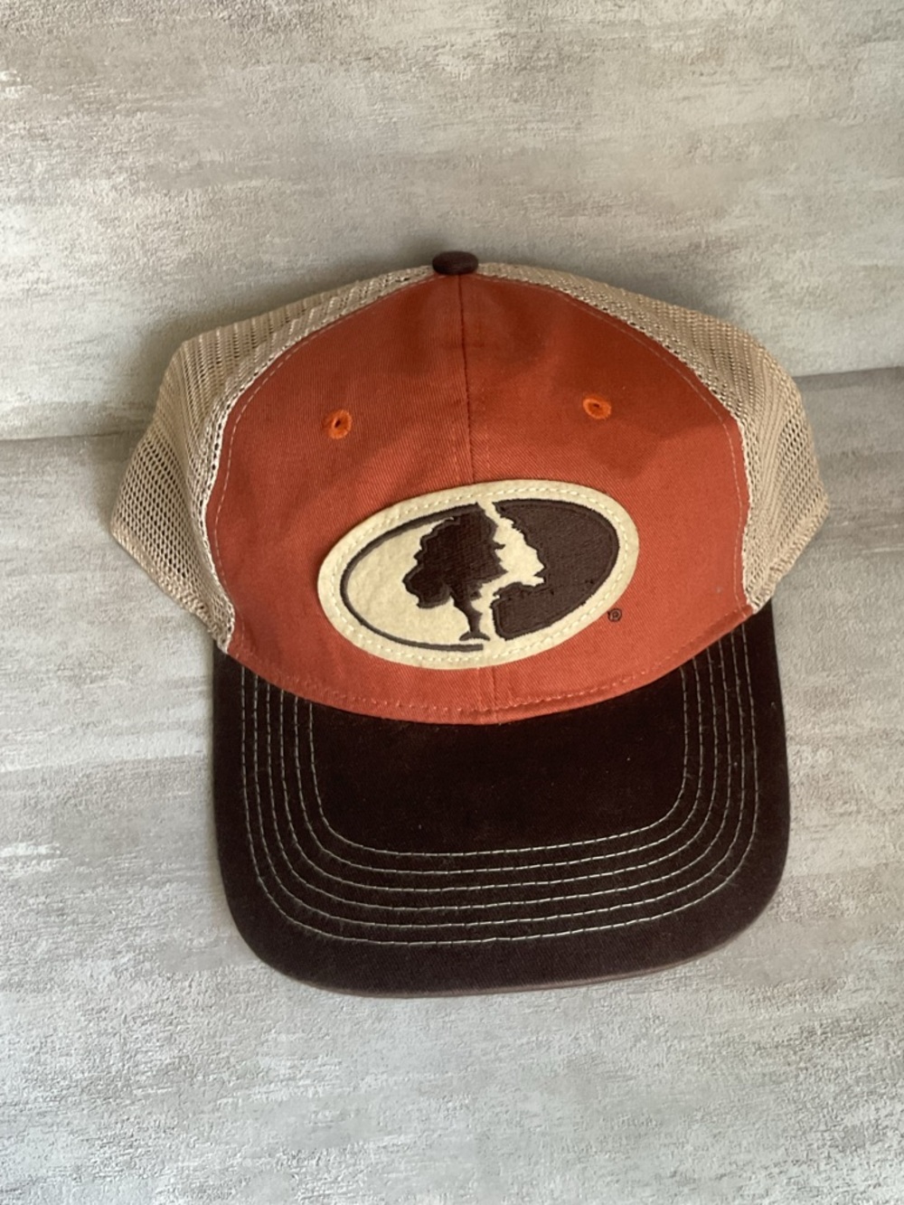 Mossy Oak Rust & Brown Trucker Hat with Silhouette Patch